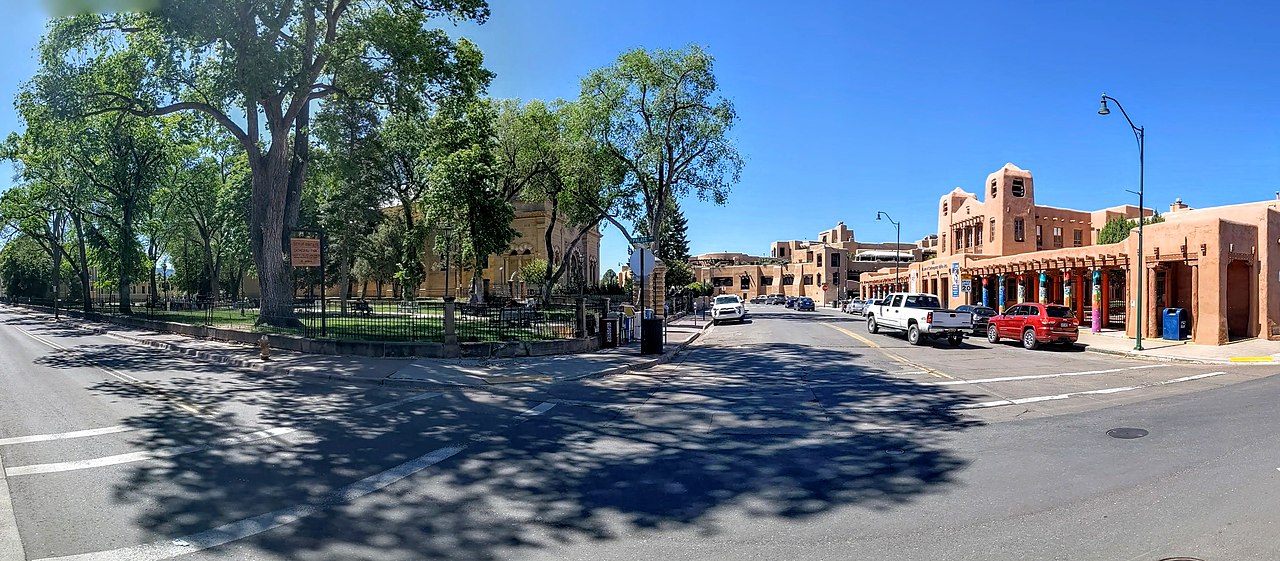 Panoramic view from E. Palace Ave., with Cathedral Park and Cathedral Basilica of St. Francis of Assisi (left), and Museum of Contemporary Native Arts (right)