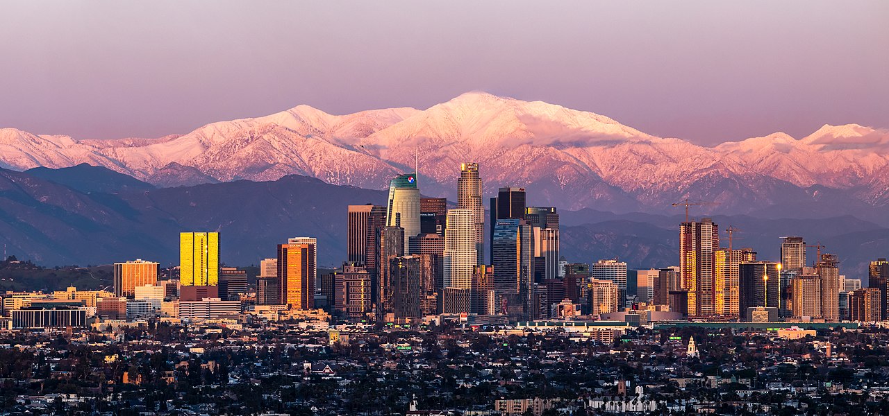 February shot of downtown Los Angeles with Mount Baldy in the background after a large snow storm.