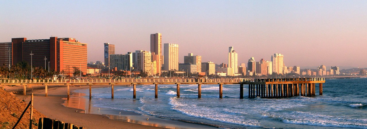 Skyline of Durban, South Africa, in the morning. View from Vetchies pier. The red building on the left side ist Addington Hospital, followed by the beachfront.