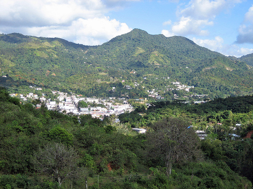Scenic view of Adjuntas Pueblo and El Gigante Dormido from a nearby mountain